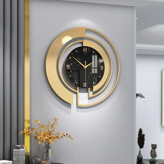 Horloge murale métal doré