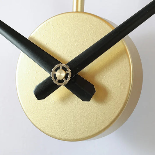 Grande horloge murale noire et dorée