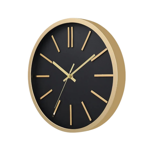 Horloge murale noire et dorée