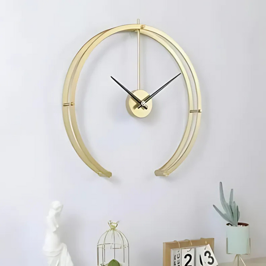 Grande horloge murale noire et dorée